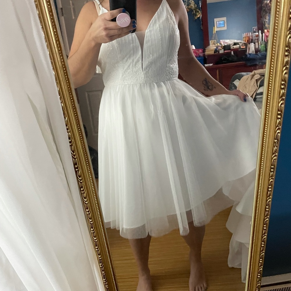 White prom dress with sparkles.